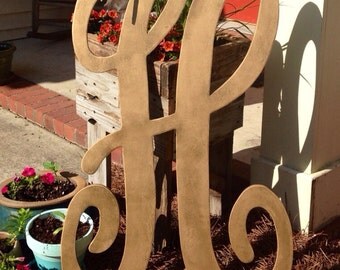 3ft wooden monogram letter measures approx 36inches by 24inches Thicker/larger font letters will have an additional charge if over 2ft wide