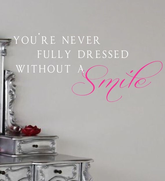 Wall Decal You&#39;re never fully dressed without a smile