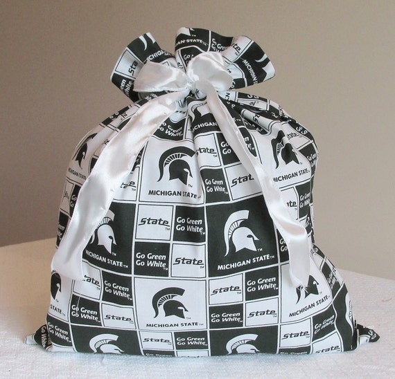 Items similar to Large fabric gift bag in Michigan State pattern