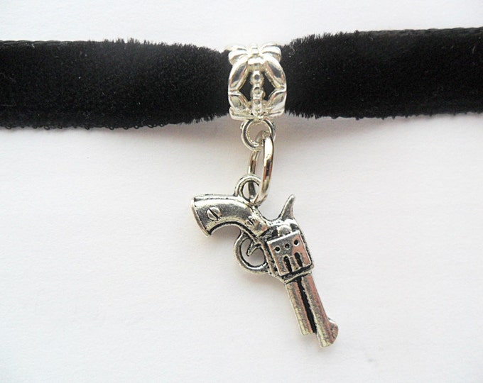 Velvet choker with gun charm pendant and a width of 3/8” Black Ribbon Choker Necklace (pick your neck size)