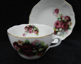 Tea Cup and Saucer: Hand decorated porcelain