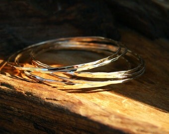 14k solid gold bangle. Gold bangle set. Gold bangle bracelets - single, set of three, five or seven. Hammered handmade jewelry Modern rustic