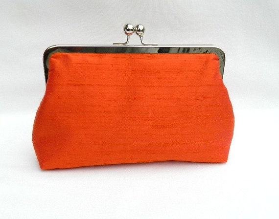 orange designer clutch