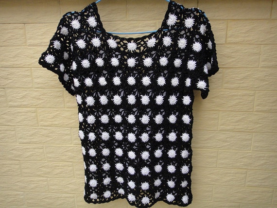 white and black polka dot blouse