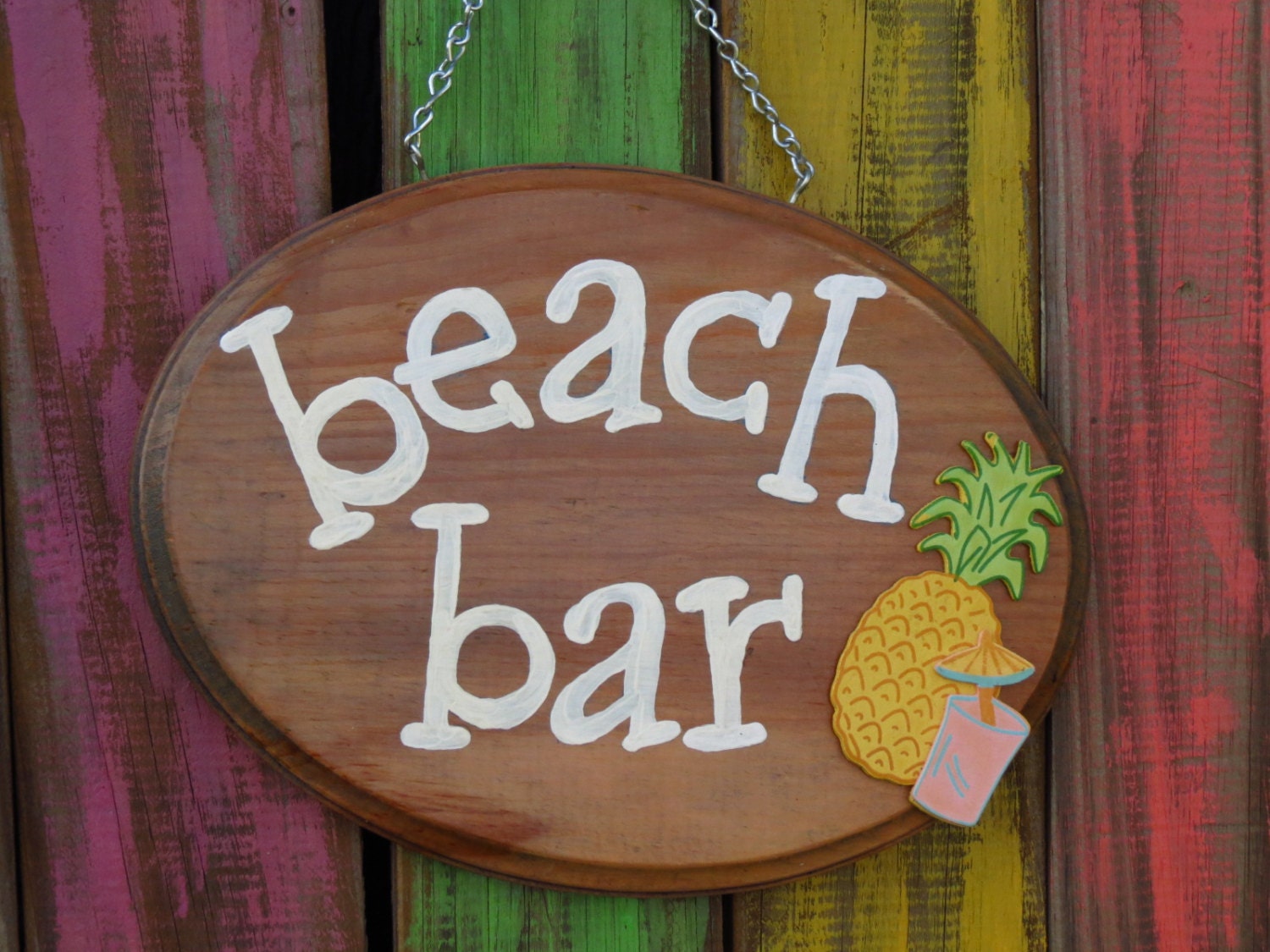 Beach Bar wooden sign with wooden pineapple and drink