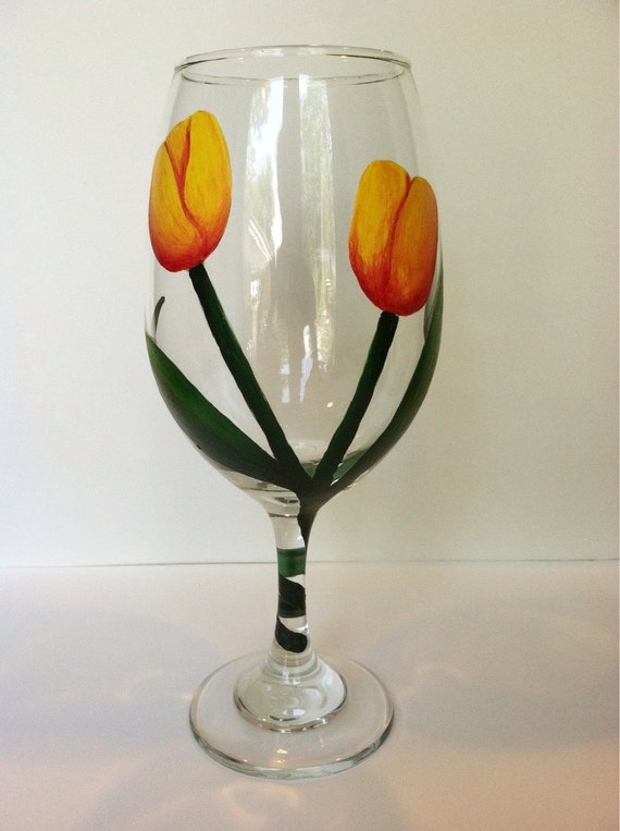 Items similar to Hand painted tulip wine glass on Etsy