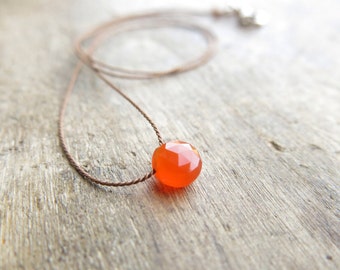 Carnelian necklace. Minimalist necklace with a small carnelian faceted coin briolette. Minimal choker with small carnelian faceted pendant