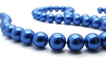 Popular items for royal blue pearls on Etsy