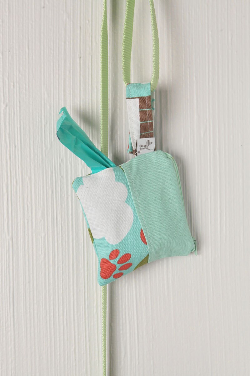 dog waste bag holdersmade from remade dog beds snaps onto