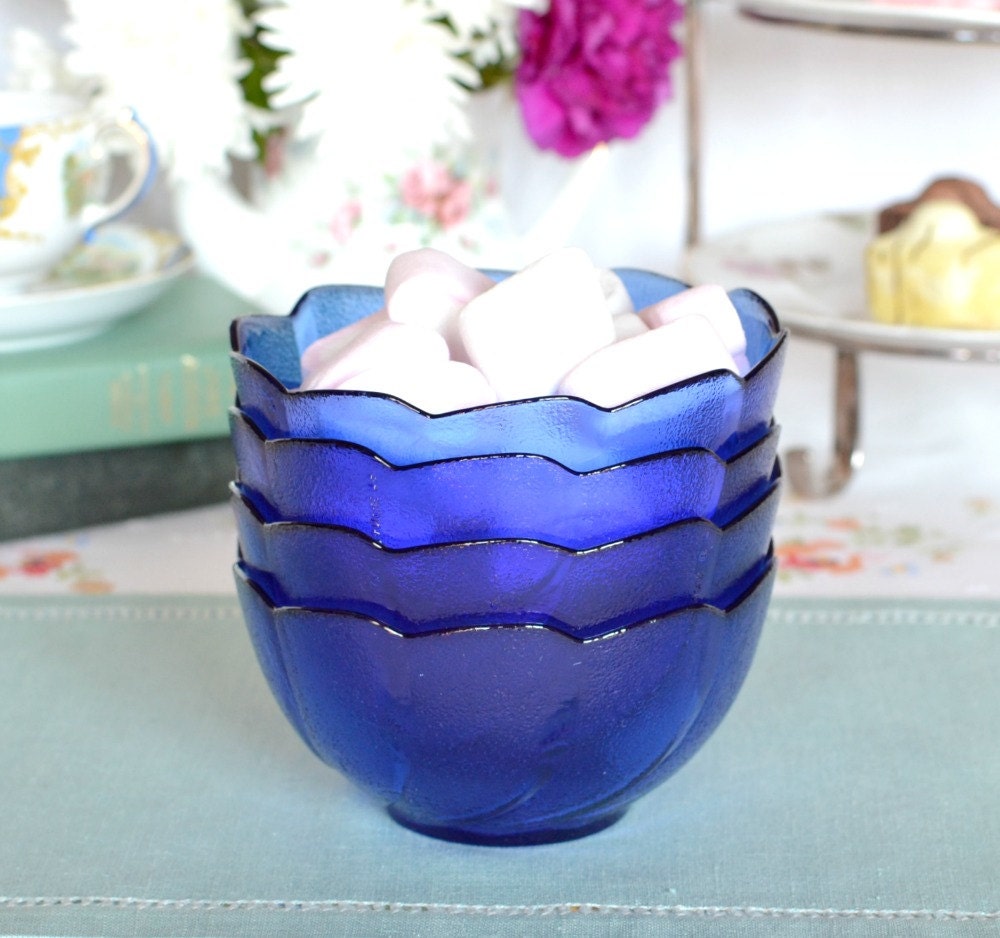 Set of 4 cobalt blue glass dessert bowls / by NancysVintageChina