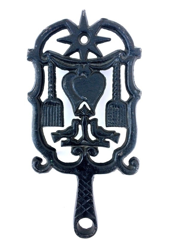 Items similar to Vintage Cast Iron Trivet Hot Plate on Etsy