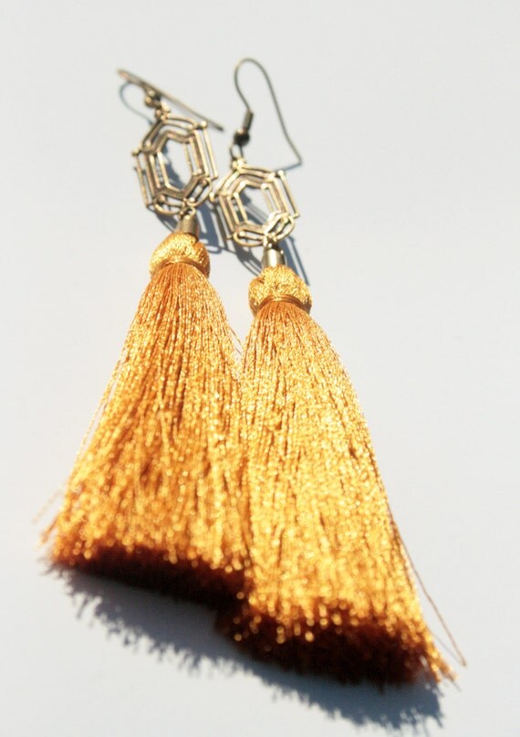 Items similar to Very Long earring + XL Silk gold tassel on Etsy