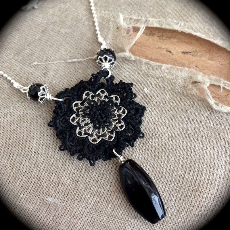 https://www.etsy.com/listing/173262673/black-and-silver-one-of-a-kind-tatted?
