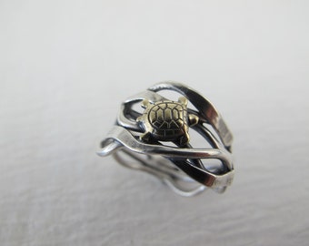 ... and Silver Kelp ring s ize 712 ready for shipment can be resized