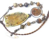 Acosmist. Cosmic rustic Victorian tribal assemblage iridescent gold leaf  necklace.