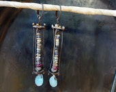 Romans. Ancient beads in caged earrings with apatite gemstone briolettes.