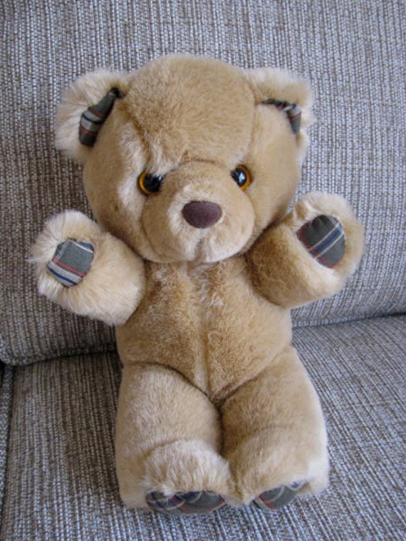 small stuffed brown bear