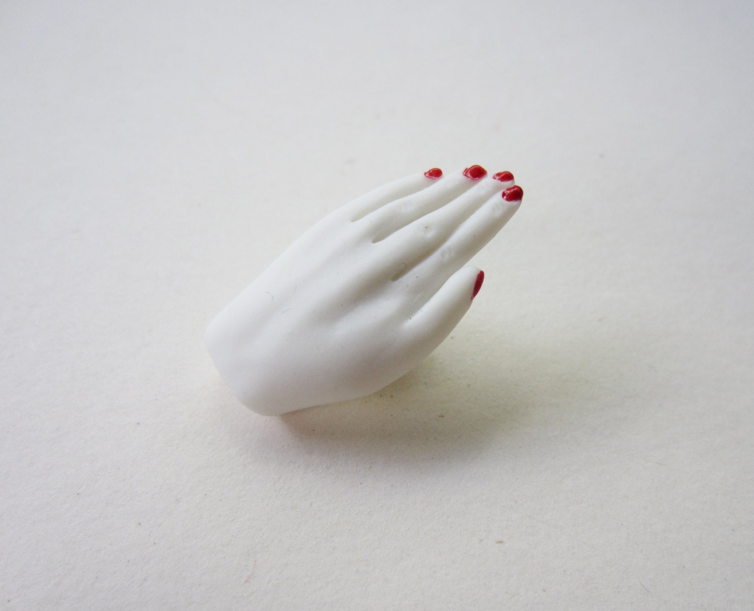 Hand made Hand white porcelain brooch pin by dailiwonderland