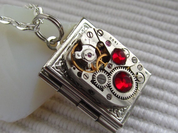 Steampunk book locket necklace with vintage watch movement and Ruby Red Swarovski crystals by Timewatch steampunk buy now online