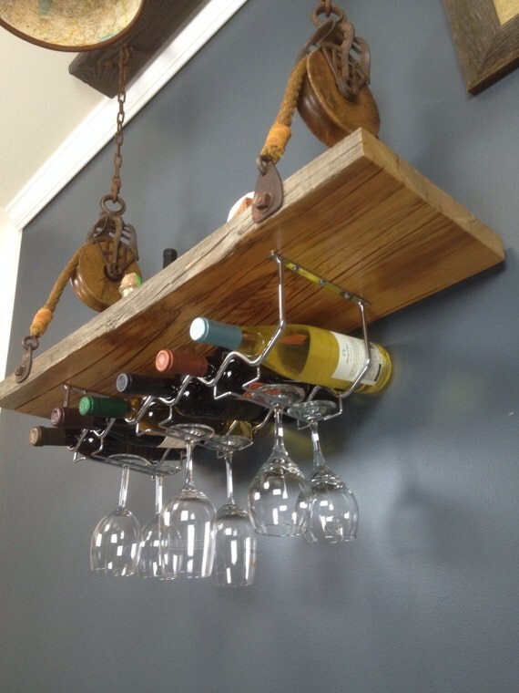 Items similar to Hanging wine rack on Etsy