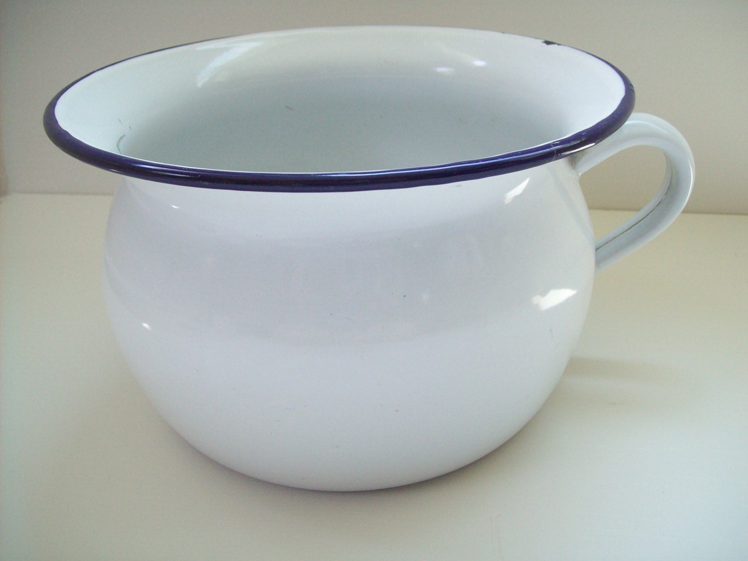 Vintage white enamel chamber pot