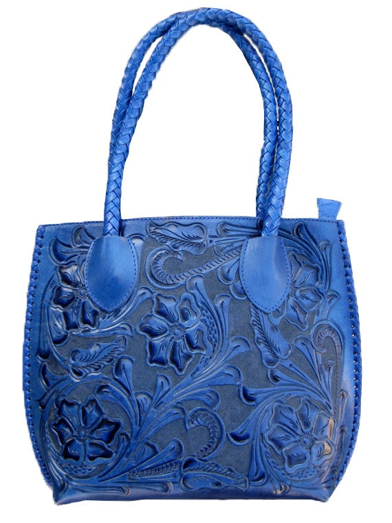 Items similar to Hand Carved Blue Leather Handbag on Etsy