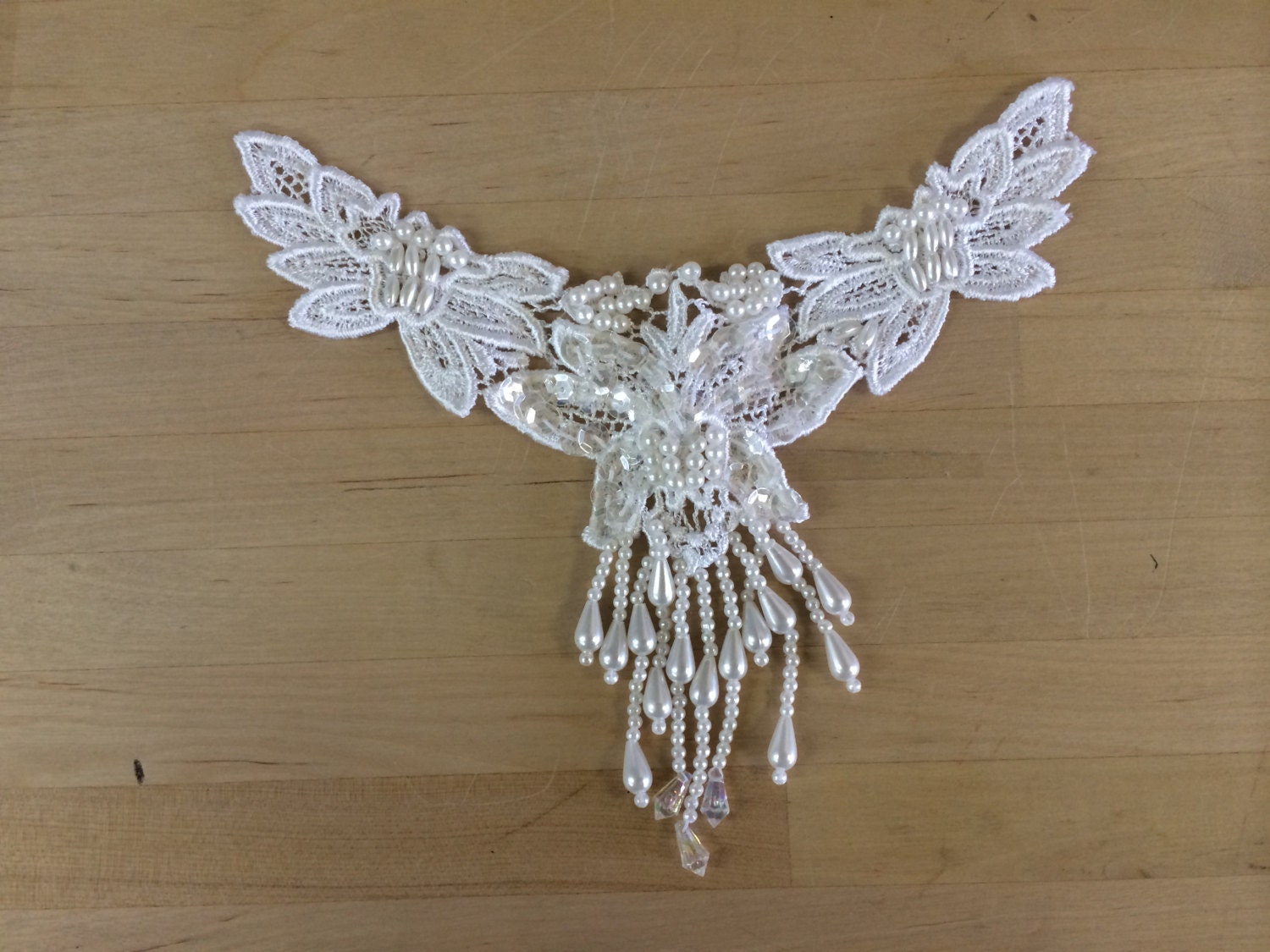 white beaded applique