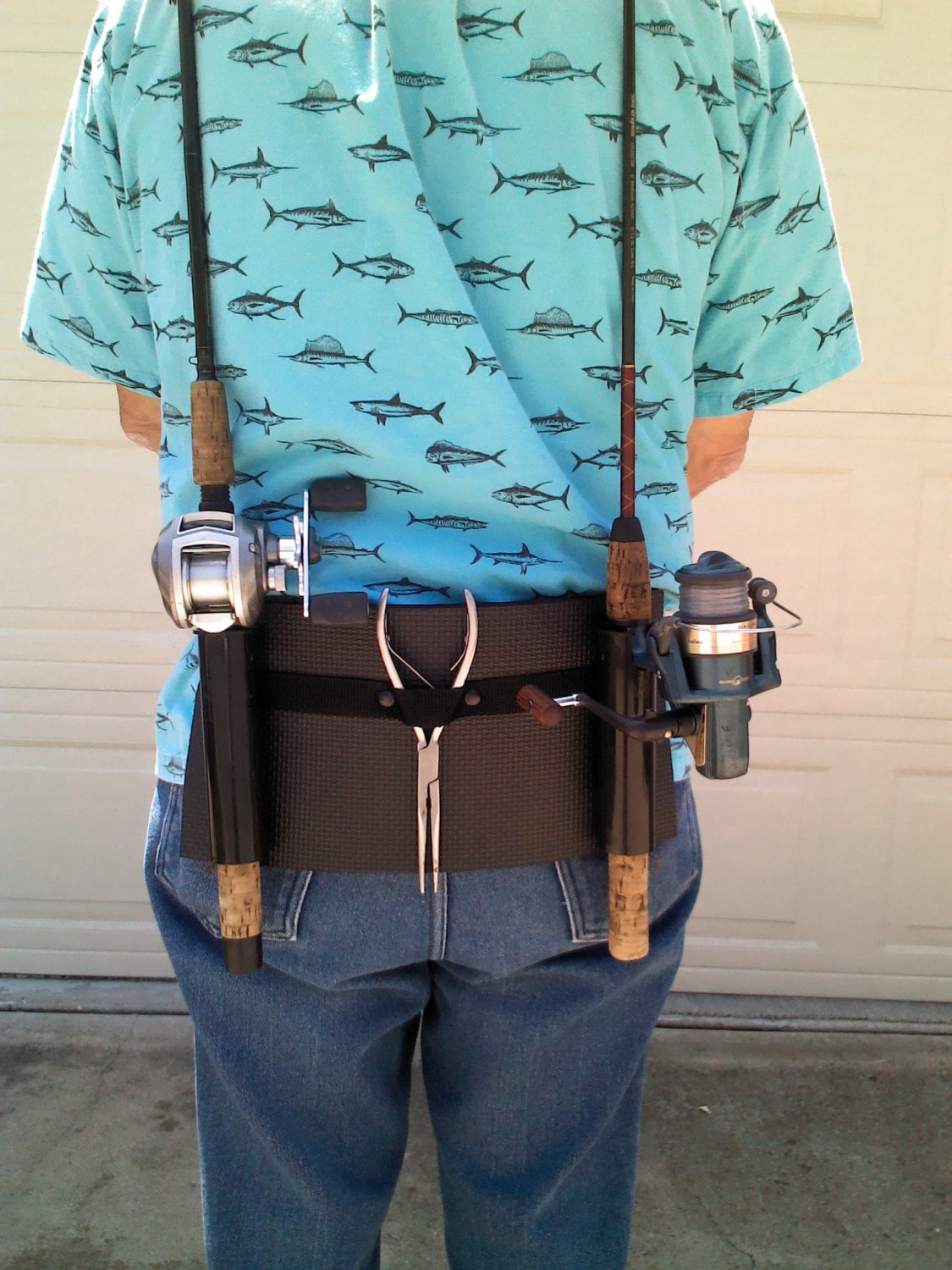 Backpack fishing rod holster / holder