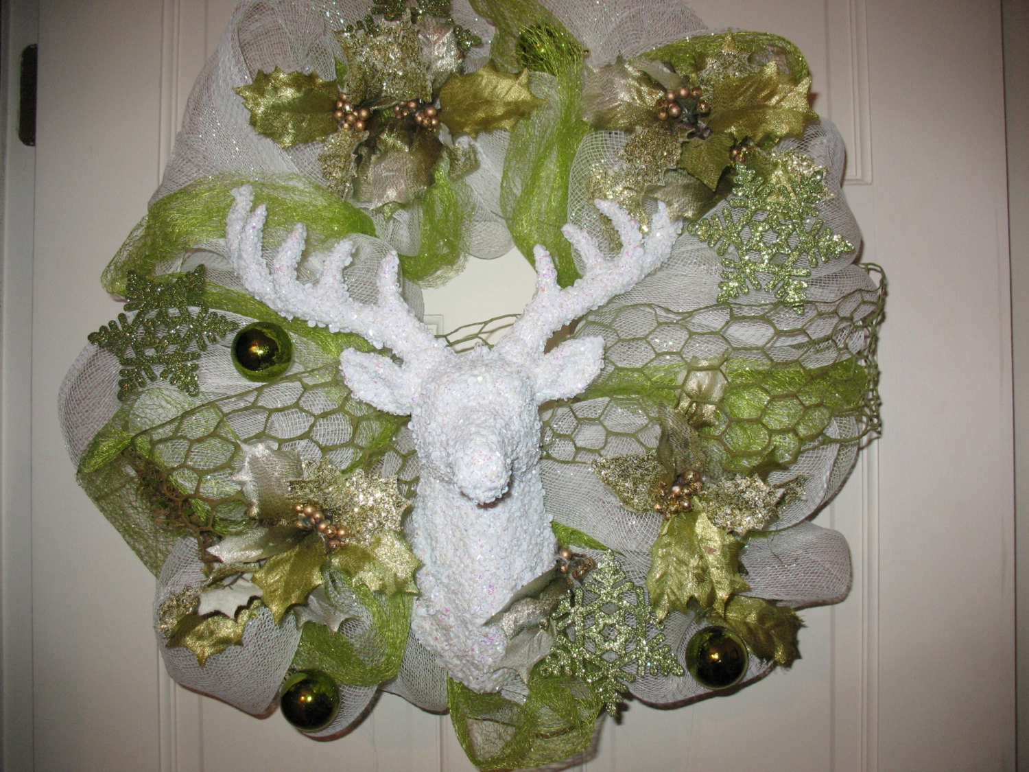 White mesh wreath with white deer head. Sale