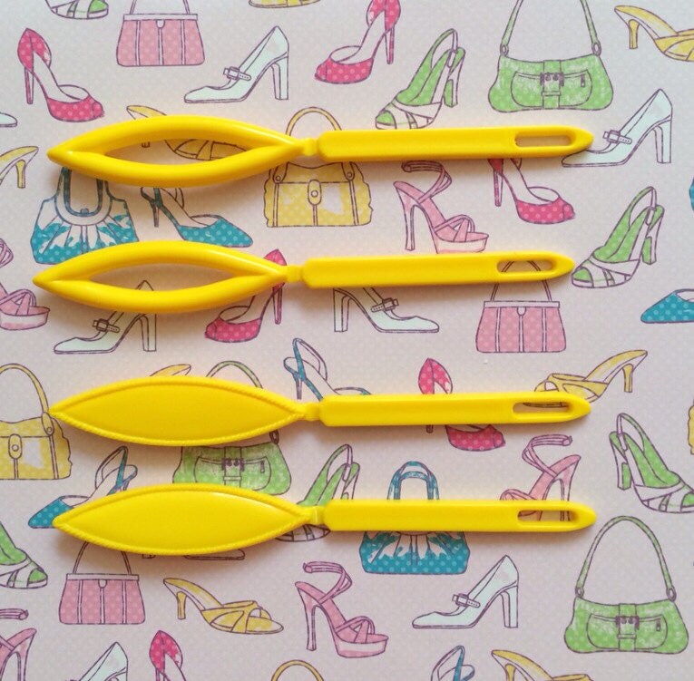 Yellow barrettes, total of 4