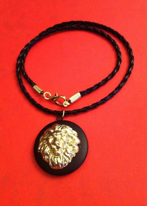 Lion head locket on a braided cord necklace lion locket