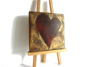 Romantic Red heart framed by textured gold mixed media. This is an original one of a kind painting.