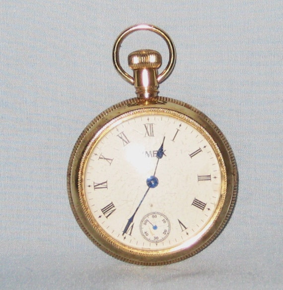 Vintage 1960's Quartz Gold-Plated Timex Pocket by BlueBayBijoux