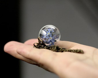 Glass ball on bronze necklace with real Forget-me-not flowers (Item No. k054)