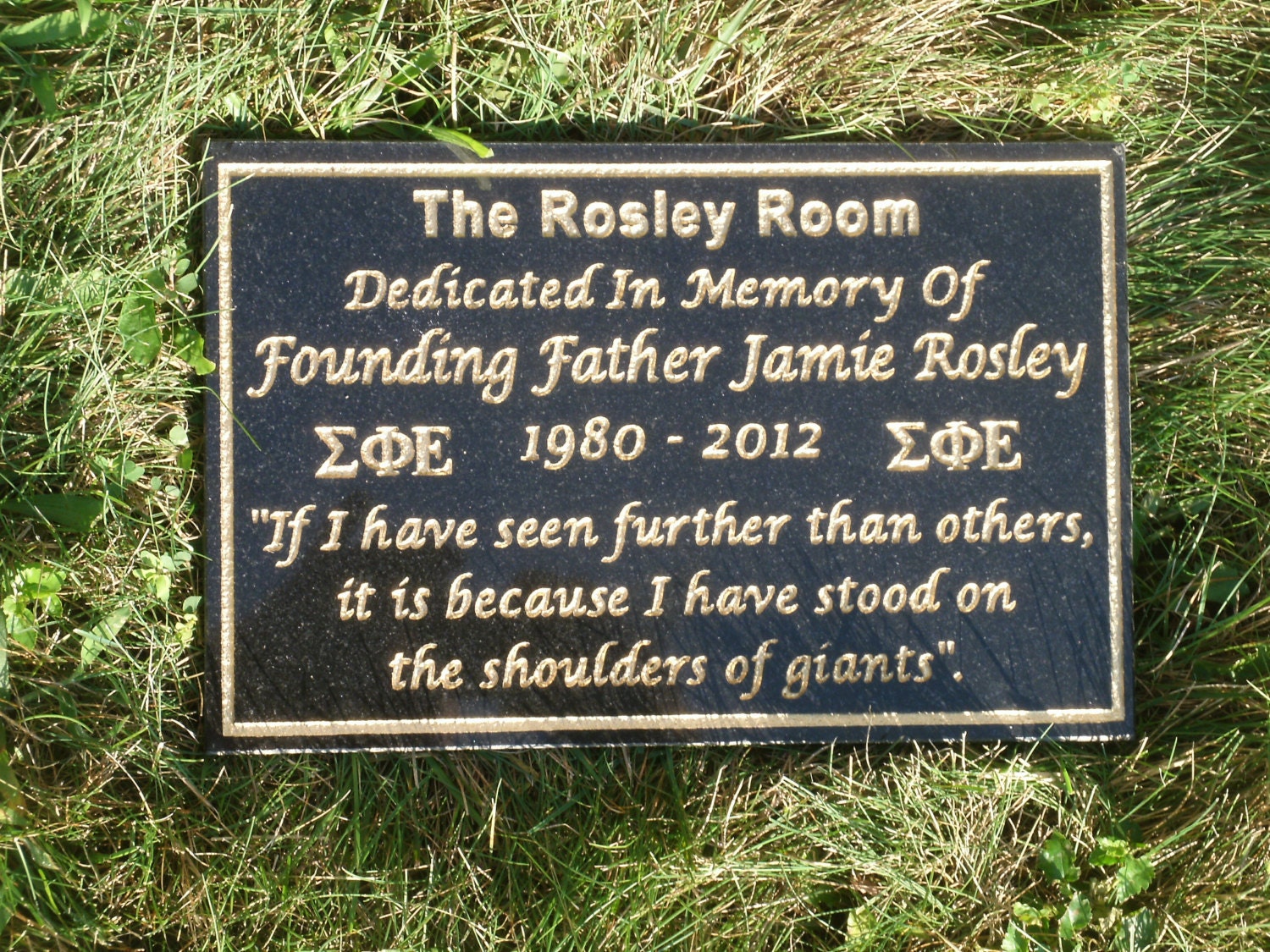 Personalized granite memorial plaque.