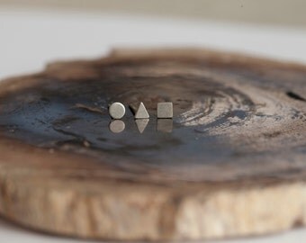 teeny tiny stud earrings. minimalist geometric earrings. everyday jewelry. sterling silver earrings. mismatched.