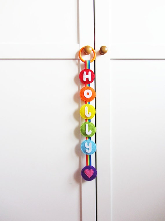Items similar to Personalised rainbow baby wall hanging, personalised