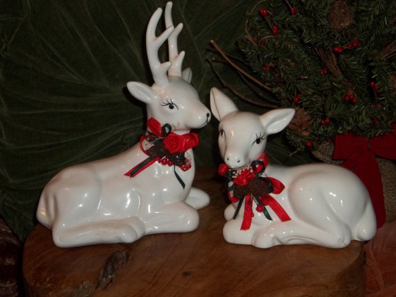 white and gold ceramic reindeer