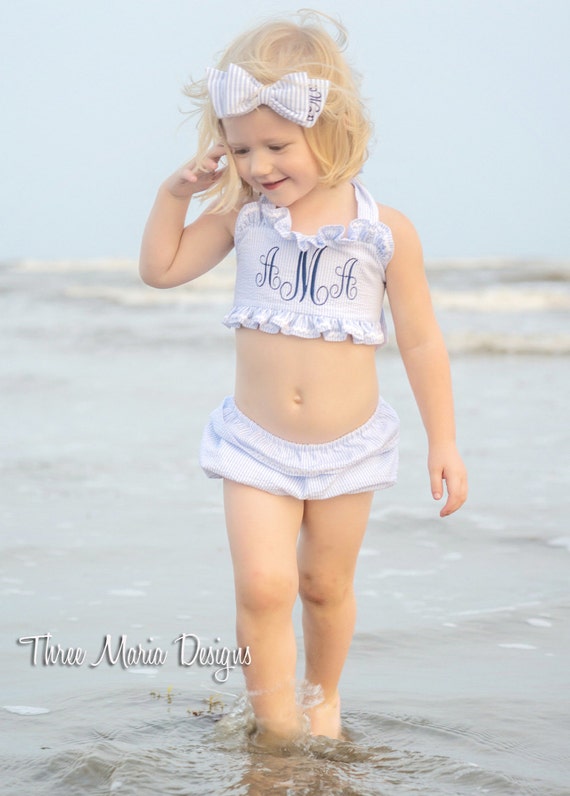 100% cotton seersucker bathing suit. Ruffles accented with