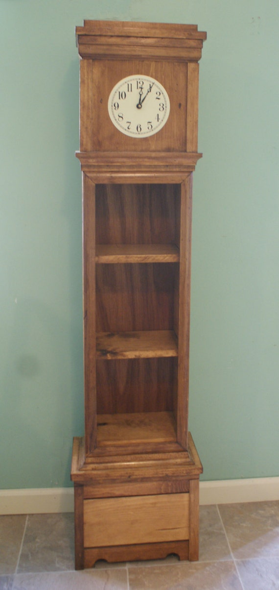 Items similar to Handbuilt pine floor clock with shelves and secret