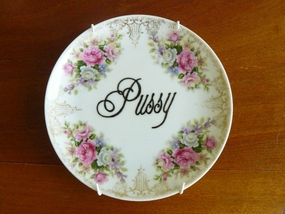Pussy plate available on etsy with a beautiful floral design