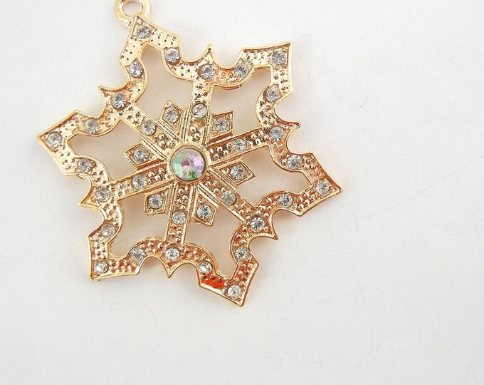 Large Cut-Out Gold-tone Rhinestone Accented Snowflake Pendant Aurora Borealis Center