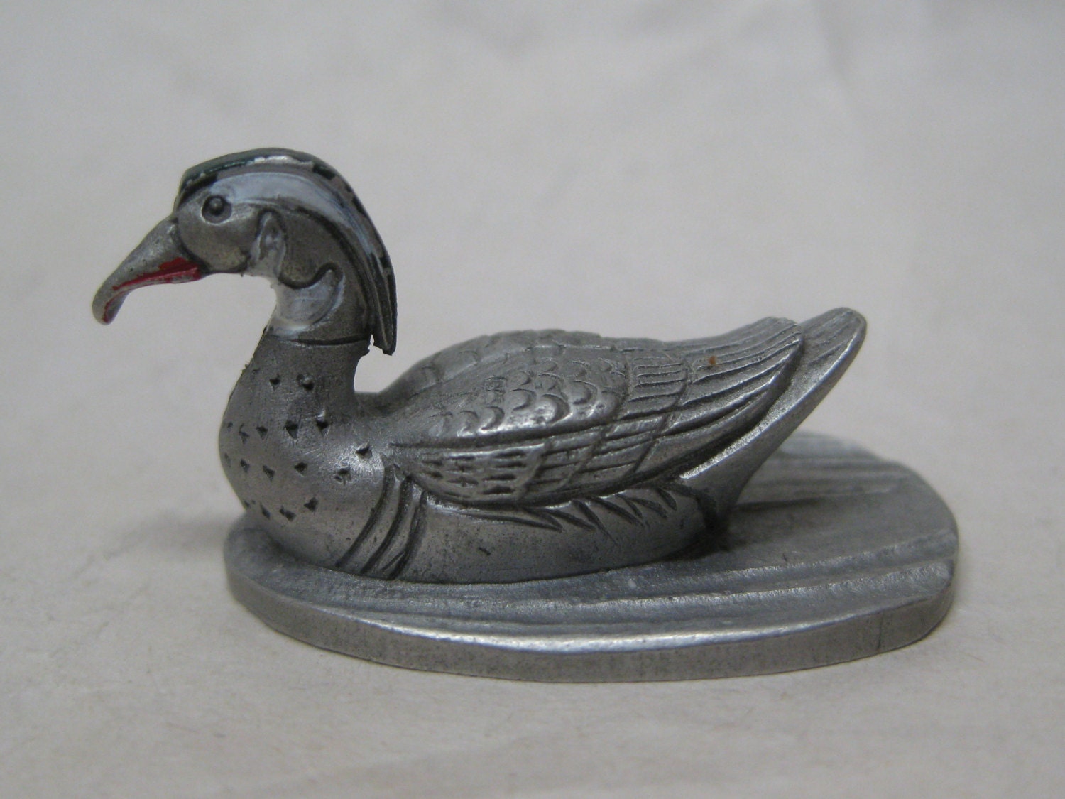 pewter duck figurine