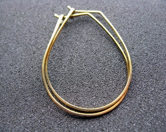yellow gold earrings in niobium wire. hoop earrings, hypoallergenic jewelry, splurge.