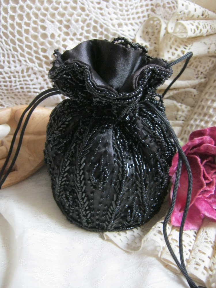Vintage small black beaded drawstring evening bag by lovinglola