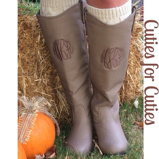 monogram plaque long leather boots