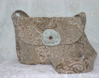 Tapestry messenger bag with silk floret accent
