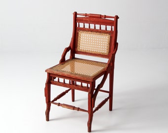 antique caned chair, red accent chair, turned wood chair