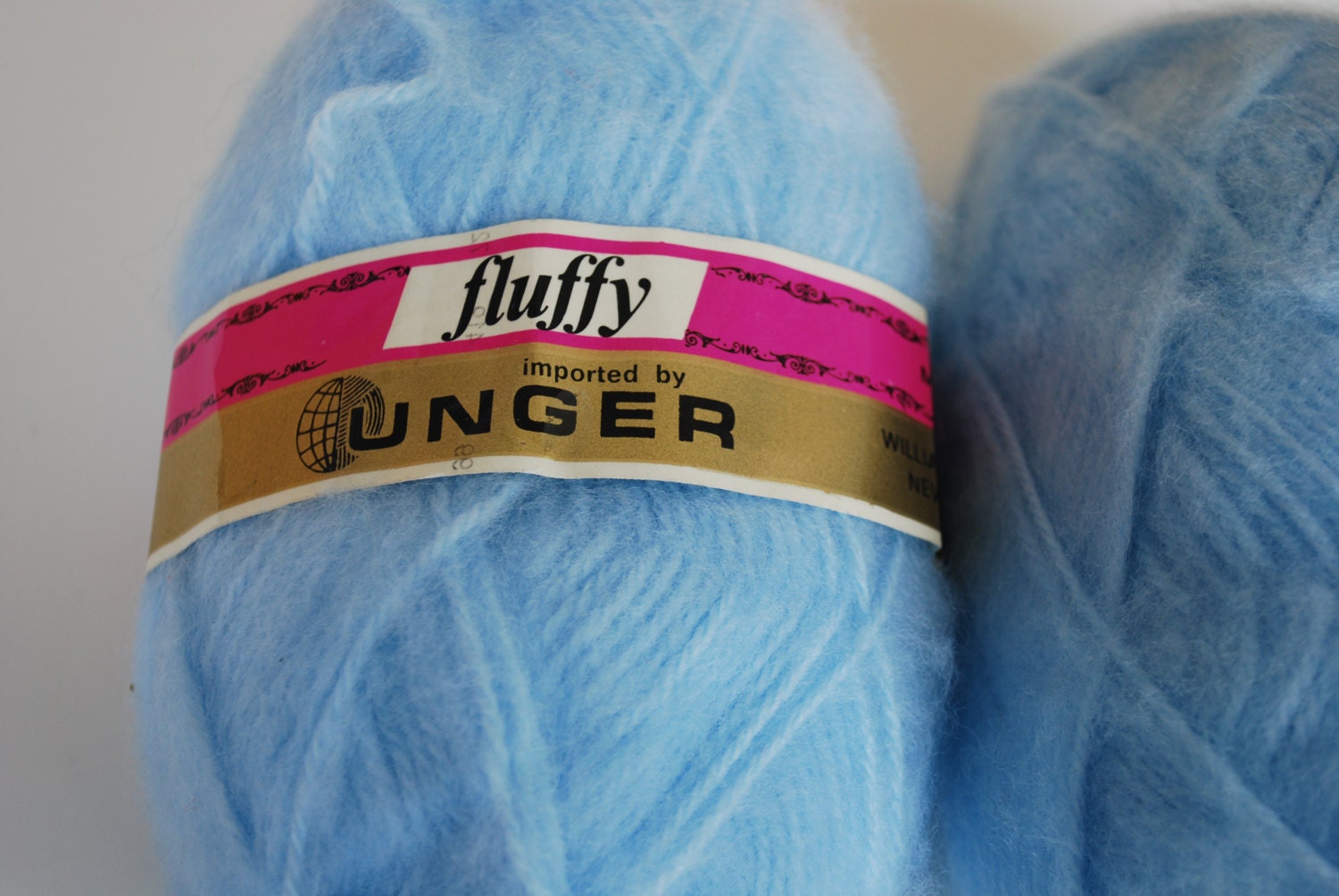 2 skeins Unger 'Fluffy' Yarn blue