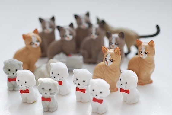 small plastic cat figures